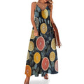 Women's maxi dress with leaf and citrus print, long and flowing, ideal for summer, formal occasions and weddings.